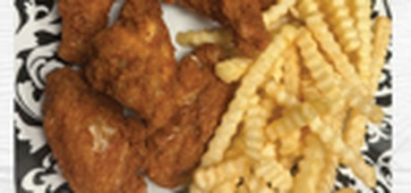 Chicken Wings & Fries at Gourmet Grill